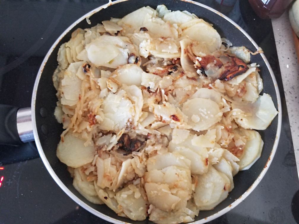Potato and onions cooked, ready for the egg.
