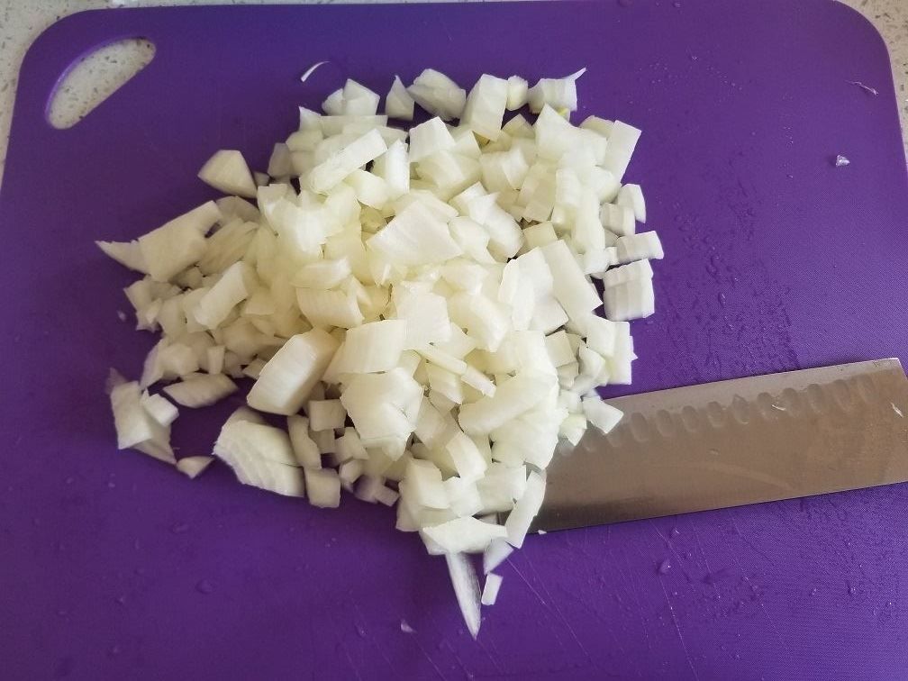Chopped onions ready for the pot.